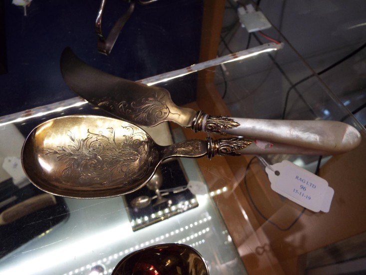 A pair of French Meritz gilded silver spoon and knife