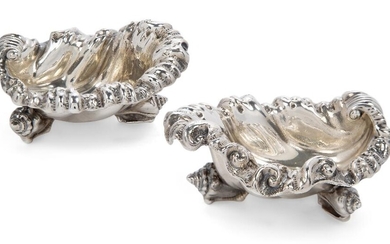A pair of William IV silver shell bonbon dishes, London, 1836, Edward, John & William Barnard, designed with scrolling rims to shell-shaped bodies raised on three conch shell feet, 10cm long, 5cm high, total weight approx. 8.4oz (2) Provenance:...