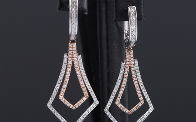 A pair of brilliant earrings in 14 kt. rose and white gold, 0.39 ct. (2)