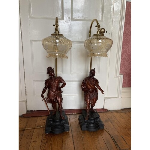 A pair of bronzed Spelter Table Lamps, each modelled as a Ro...