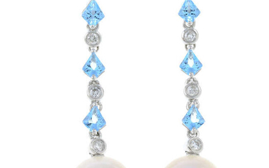 A pair of cultured pearl, diamond and blue topaz earrings.