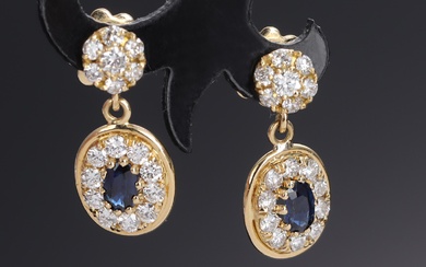 A pair of sapphire and diamond earrings of 18 kt. gold (2)