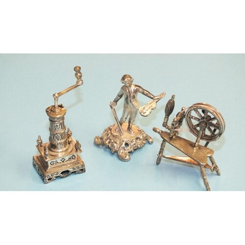 A silver miniature model of a coffee grinder, 65mm high, a s...