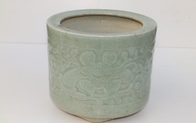 A small antique Chinese celadon glazed jardiniere, of cylindrical...