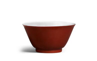 A small coral-red-backed bowl