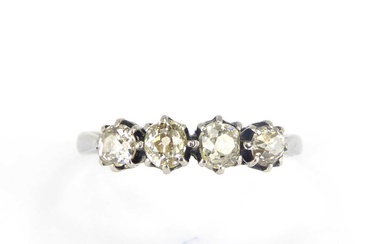 An 18ct white gold four-stone diamond ring, the head set...