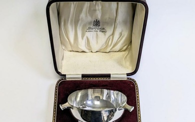 An A George V Irish hallmarked sterling silver three handled...
