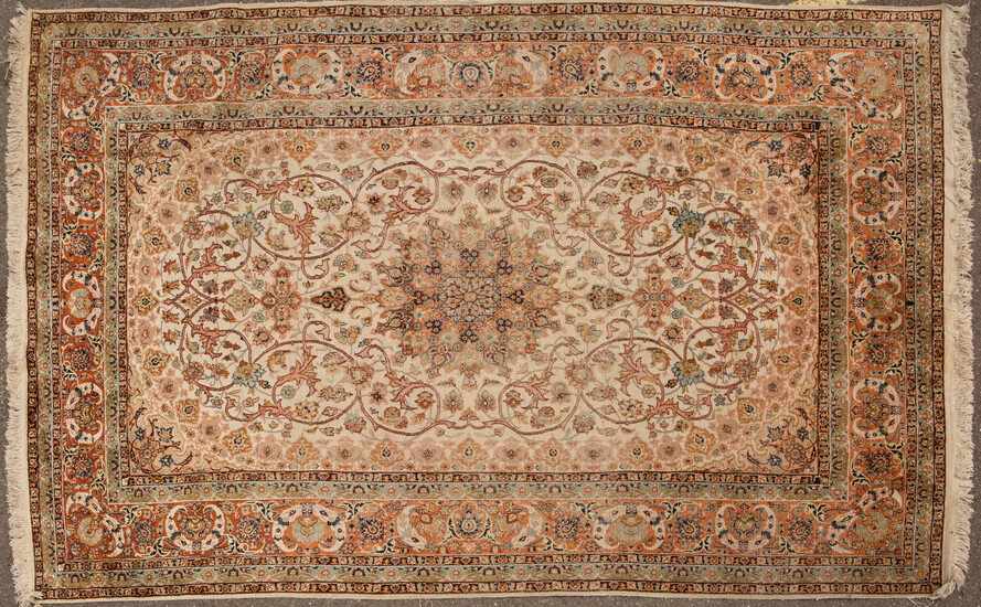 A Kashmiri cream ground rug
