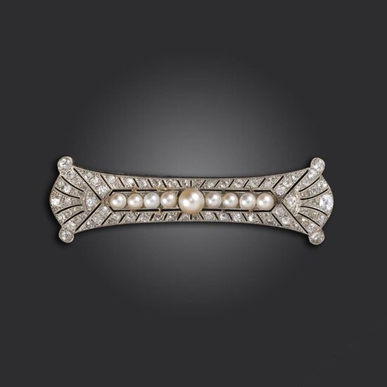 An Edwardian pearl and diamond brooch, set with a centre line of pearls, with circular and rose-cut diamonds millegrain set to the pierced platinum mount, 6.1cm wide