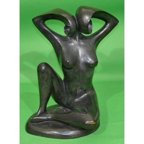 An Unusual Bronze Sculpture, body of a seated female nude ha...