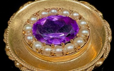 An amethyst, seed pearl and 9ct gold oval pendant brooch, th...