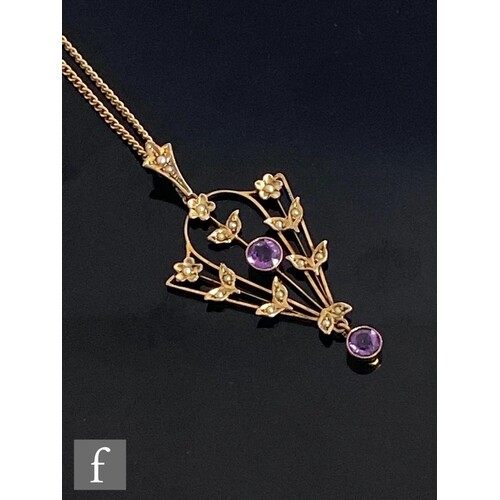 An early 20th Century 9ct amethyst and seed pearl open work ...