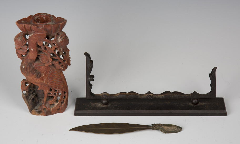 An early 20th century bronze letter opener, finely modelled in the form of a cicada eating a leaf, l