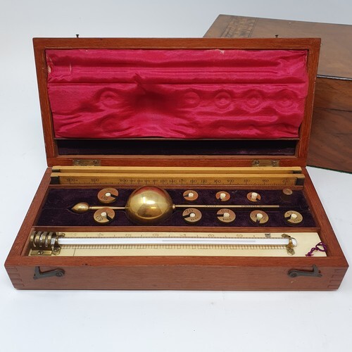 An early 20th century hydrometer, in a mahogany and ivory in...
