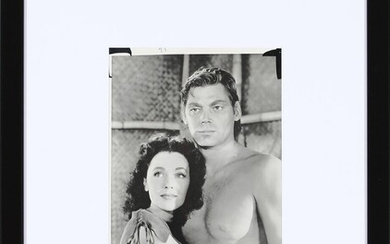SOLD. An original b/w press or still photograph of the American swimmer and actor Johnny...