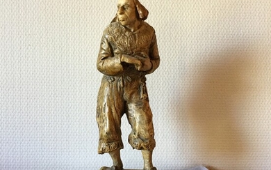SOLD. Axel Locher: A patinated and partly painted plaster figurine. Signed Axel Locher 1913. H....