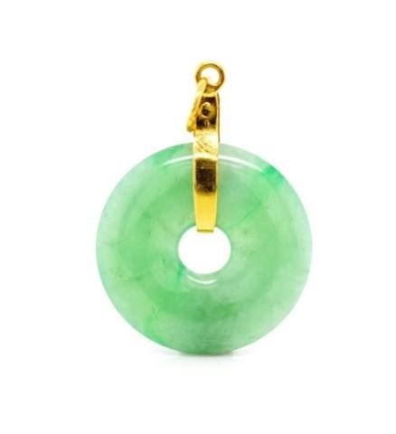 Carved Jade Bi disc pendant marked 18 750 gold bail. Approx ...