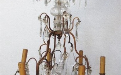 Chandelier in partially gilded metal with decoration of pendants and...