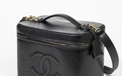 NOT SOLD. Chanel: A "Make-up Beauty Bag" of black Caviar leather with one large compartment,...