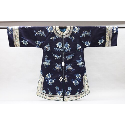 Chinese robe in blues, using silk on silk with fine shaded e...