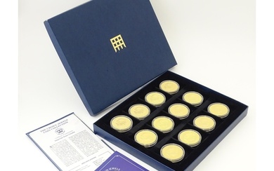 Coins: A boxed set of twelve Westminster Mint gold plated me...