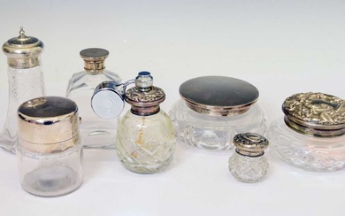 Collection of silver mounted and capped dressing table jars and pots