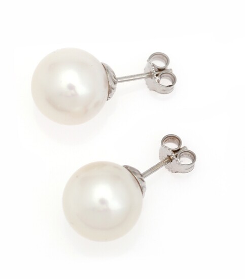 NOT SOLD. A pair of pearl ear studs each set with a cultured South Sea...
