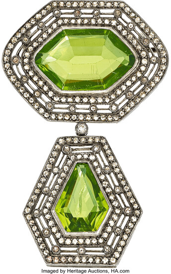Diamond, Peridot, Silver-Topped Gold Brooch The brooch features two...