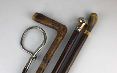 Four antique walking canes