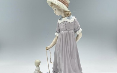 Girl with Toy Wagon 1005044 - Lladro Porcelain Figurine