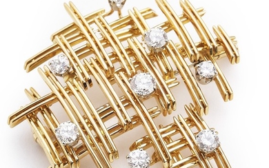 Gübelin: A diamond brooch set with numerous brilliant-cut diamonds, mounted in 18k gold. Signed Gübelin. Ref. no. 2809–36. L. app. 4.2×3.7. Ca. 1970.