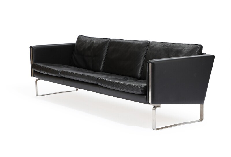 NOT SOLD. Hans J. Wegner: "CH 103". A three-seater sofa with stainless steel frame, upholstered...