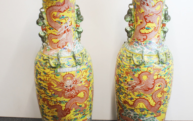 LARGE CHINESE RELIEF-DECORATED VASES.