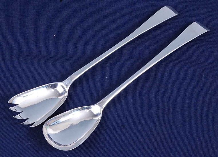 A matched pair of early 19th century silver salad servers