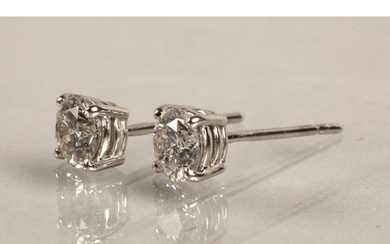 Pair of ladies 18ct white gold diamond stud earrings, each s...