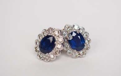 Pair of white gold, sapphire and diamond earrings in the...
