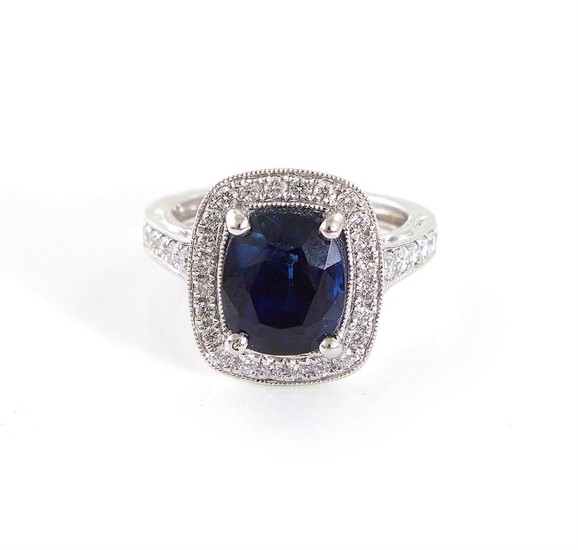 Platinum, blue sapphire and diamond ring