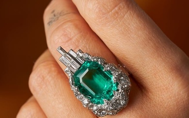 STERLE, AN IMPORTANT 9.89 CARAT UNTREATED COLOMBIAN EMERALD AND DIAMOND RING in platinum, set with