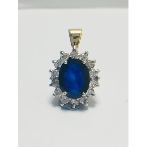 Sapphire and Diamond pendant,18ct gold,7mmx 5mm sapphire roy...