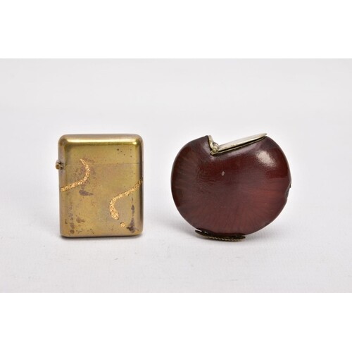 TWO BRASS VESTA CASES, the first a circular nut with hinged ...
