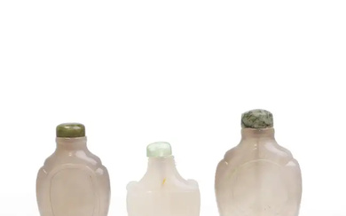 Three Chinese chalcedony agate snuff bottles Late Qing dynasty Comprising two bottles...