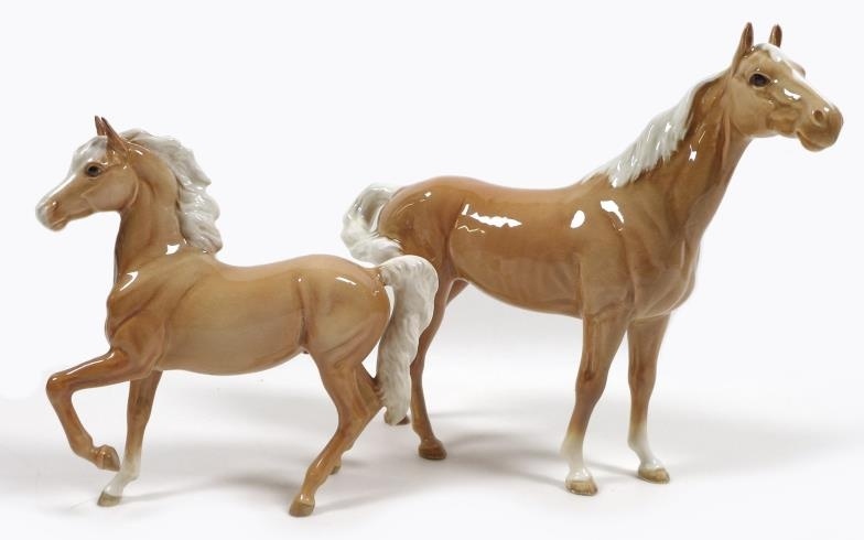Two palomino Beswick horses, comprising 'Swish Tail Horse', First...