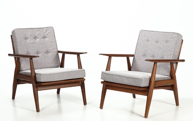 Unknown furniture manufacturer. A pair of low-backed armchairs (2)
