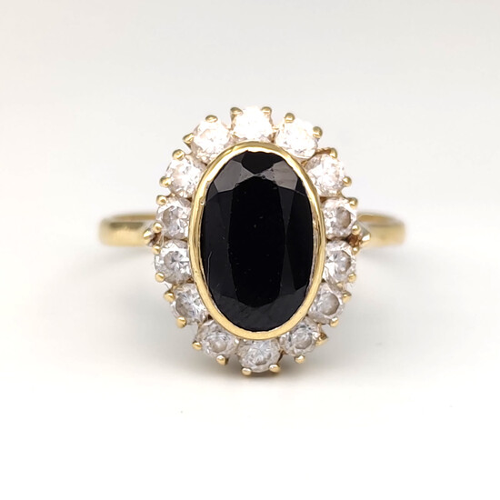 Yellow Gold Ring with Zircons and 2 Ct Sapphire