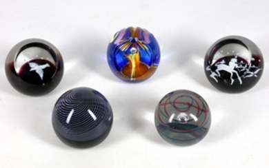 A collection of five Scottish Caithness glass paperweights,...