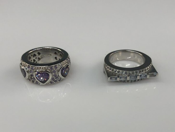 2 Sterling silver rings.