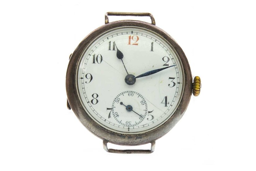 A GENTLEMAN'S SILVER MANUAL WIND TRENCH WATCH