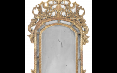A giltwood mirror (cm 142x84) (defects)