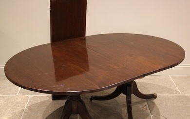 A 19th century and later twin pedestal mahogany dining table...