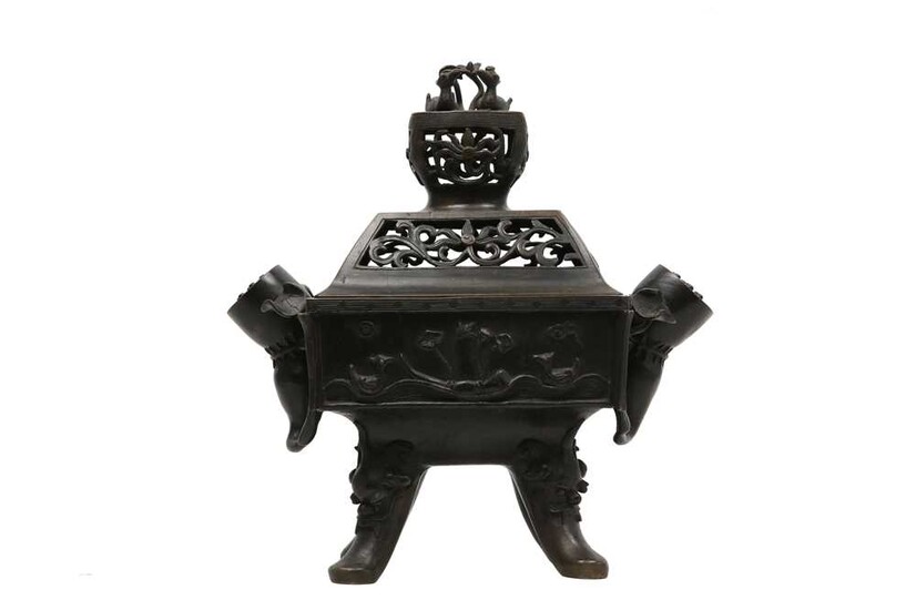 A BRONZE 'MARRIAGE' INCENSE BURNER AND COVER.